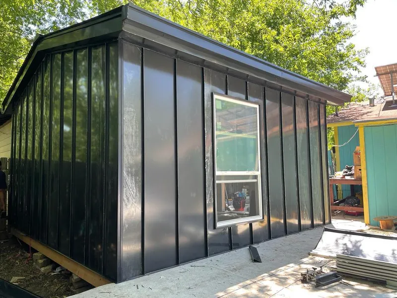 Black standing seam metal wall panels for Roof Inspection in Litchfield